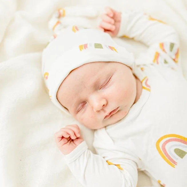 Emerson and friends newborn gown on a white background