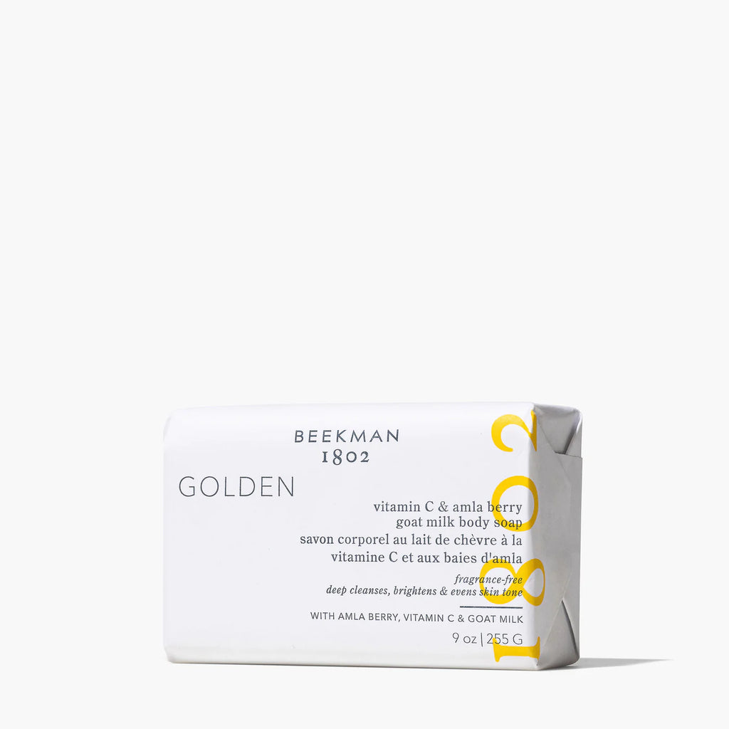 beekman golden bar soap on a white background