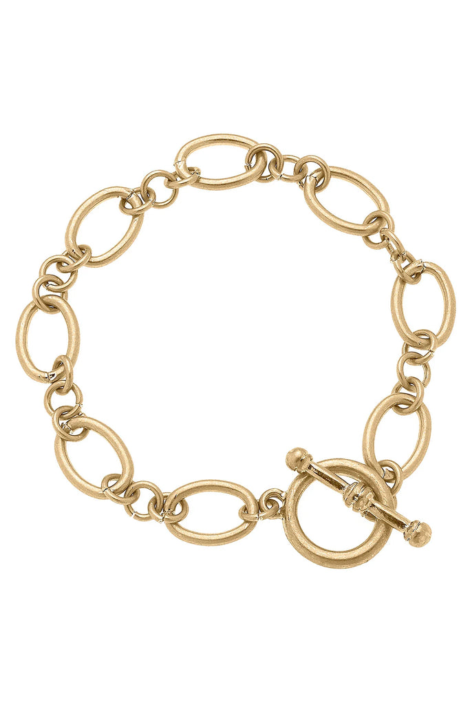 canvas charlotte chain toggle bracelet in worn gold on a white background