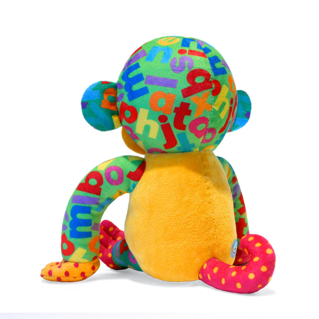 Colorful plush toy with alphabet letters on a white background