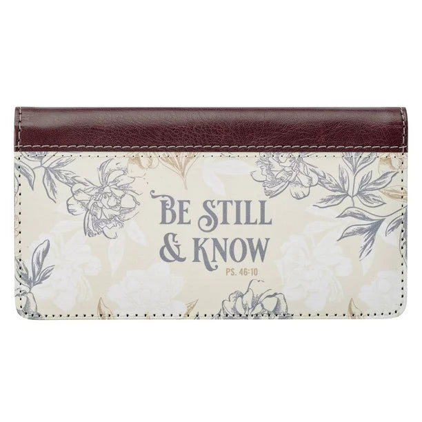 cream floral checkbook cover on a white background