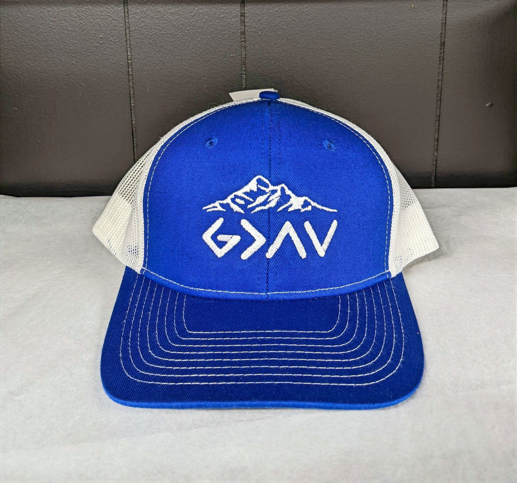 God is greater than highs and lows cap on a black and white background