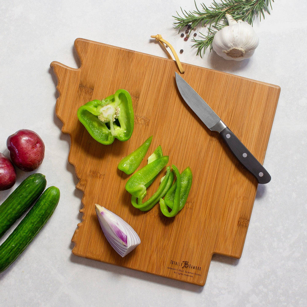 arkansas bamboo cutting board with colorful art painting on a white background
