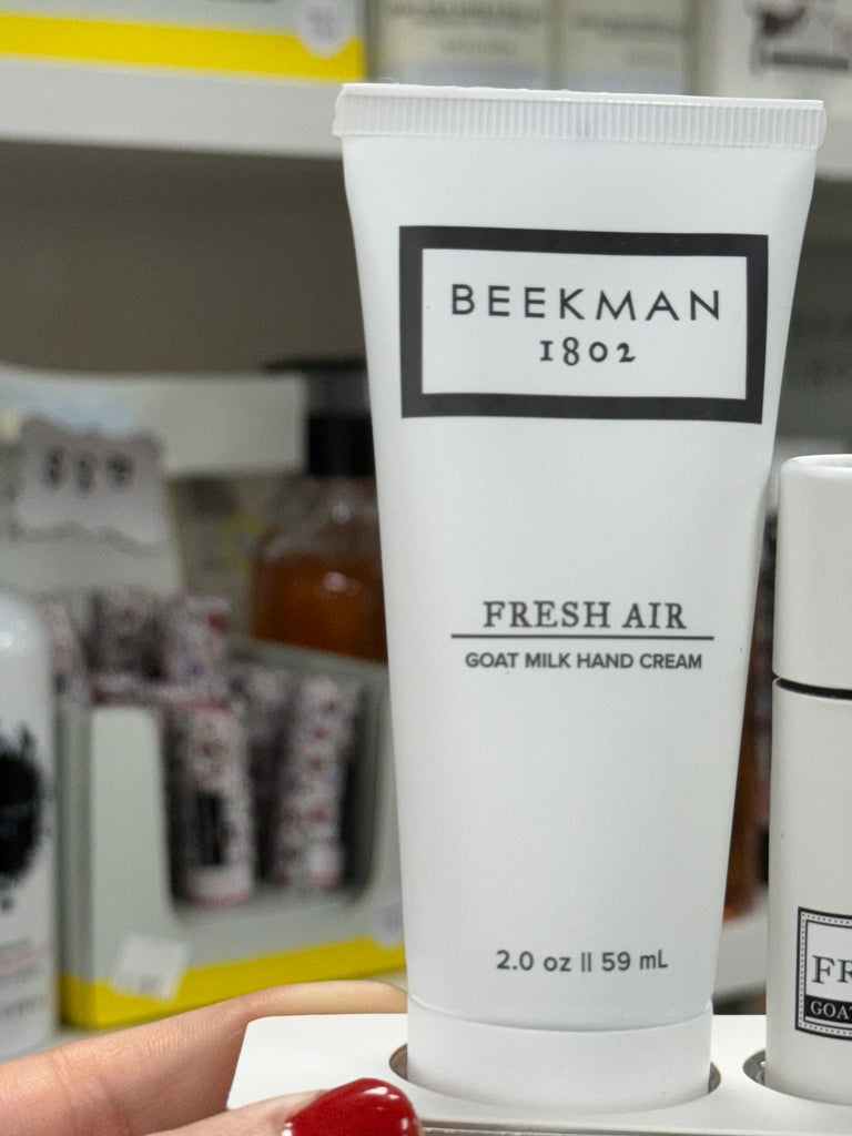 beekman Fresh Air Hand Creme & Lip Balm Set in front of blurred beekman products