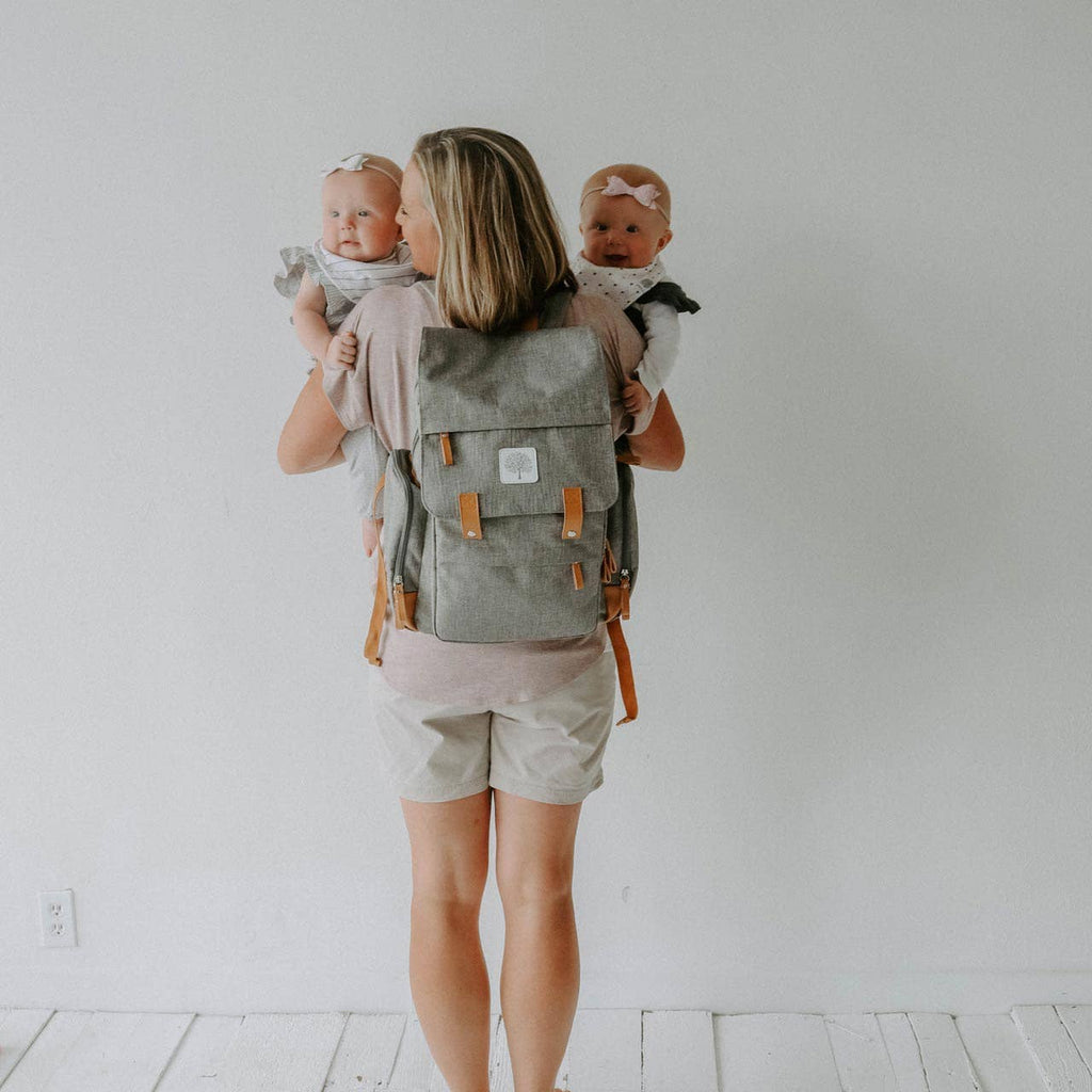 gray diaper bag on a white background