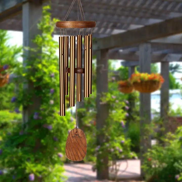 wind chime with a back yard garden in the background