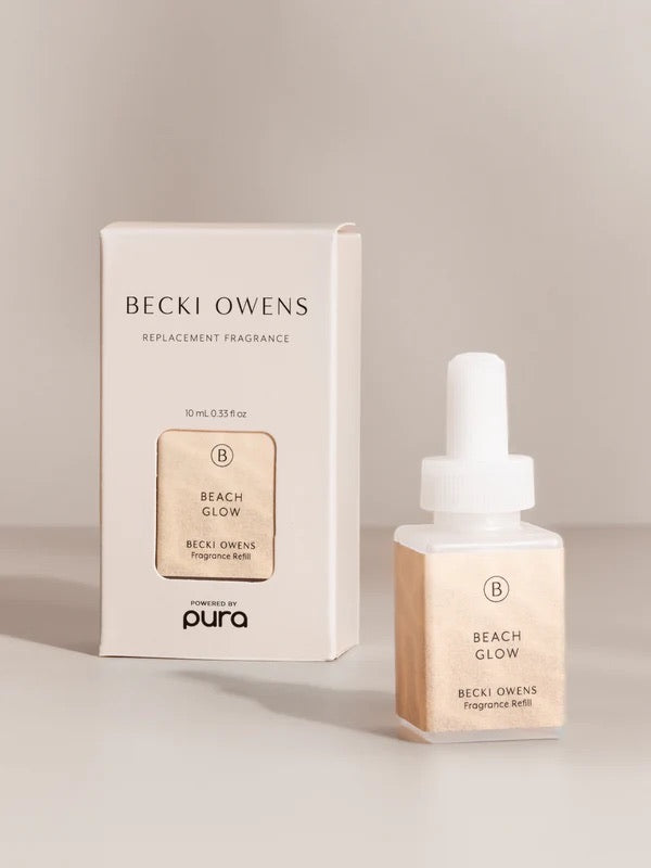 Becki owens beach glow diffuser oil on a cream background