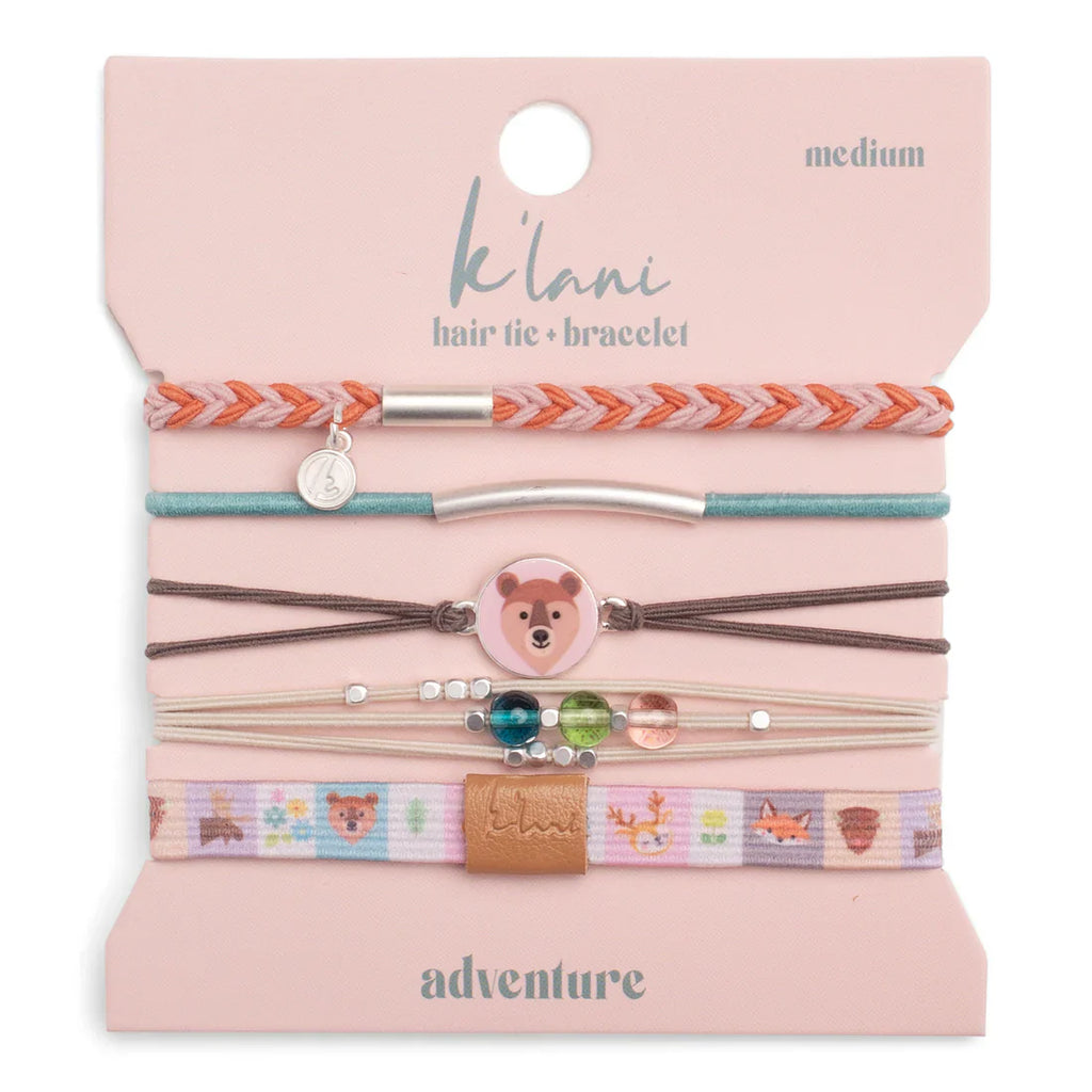 Set of hair ties and bracelets with bear design on a pink packaging