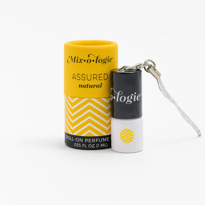 Roll-on perfume with yellow packaging and keychain attachment on a white background