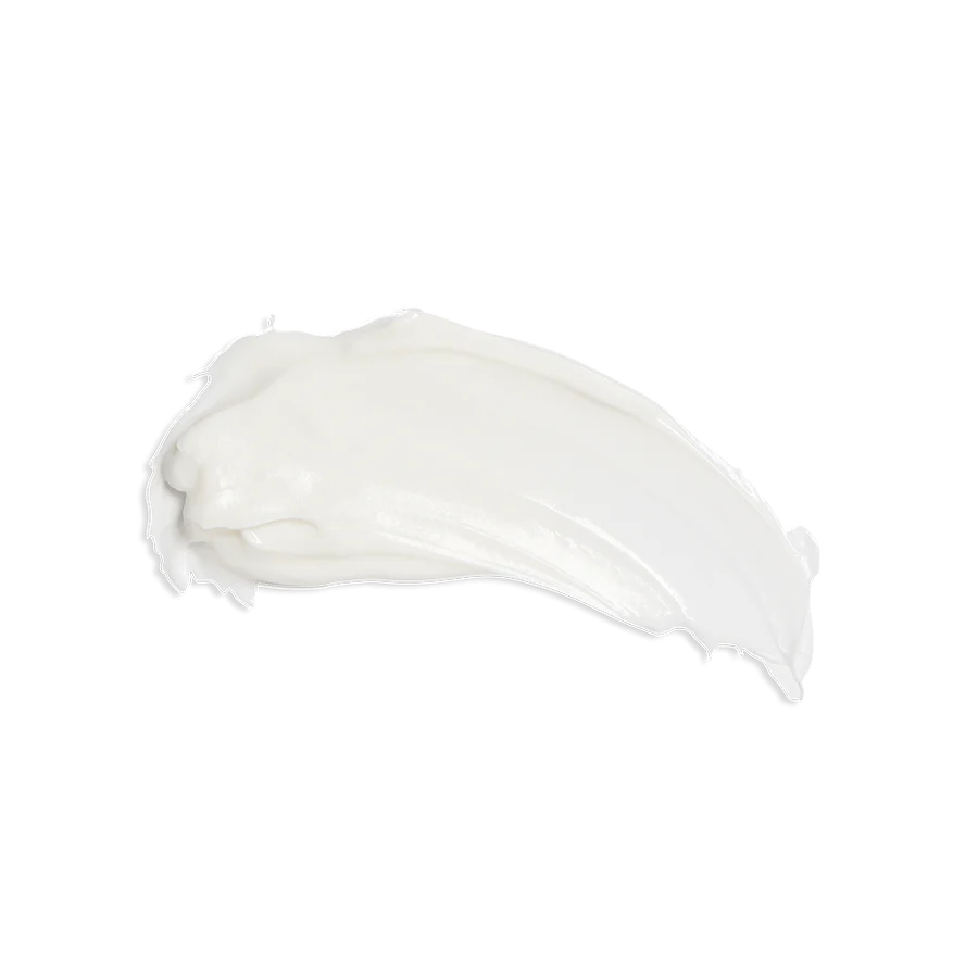 beekman whipped body cream smeared to show consistency  on a white background