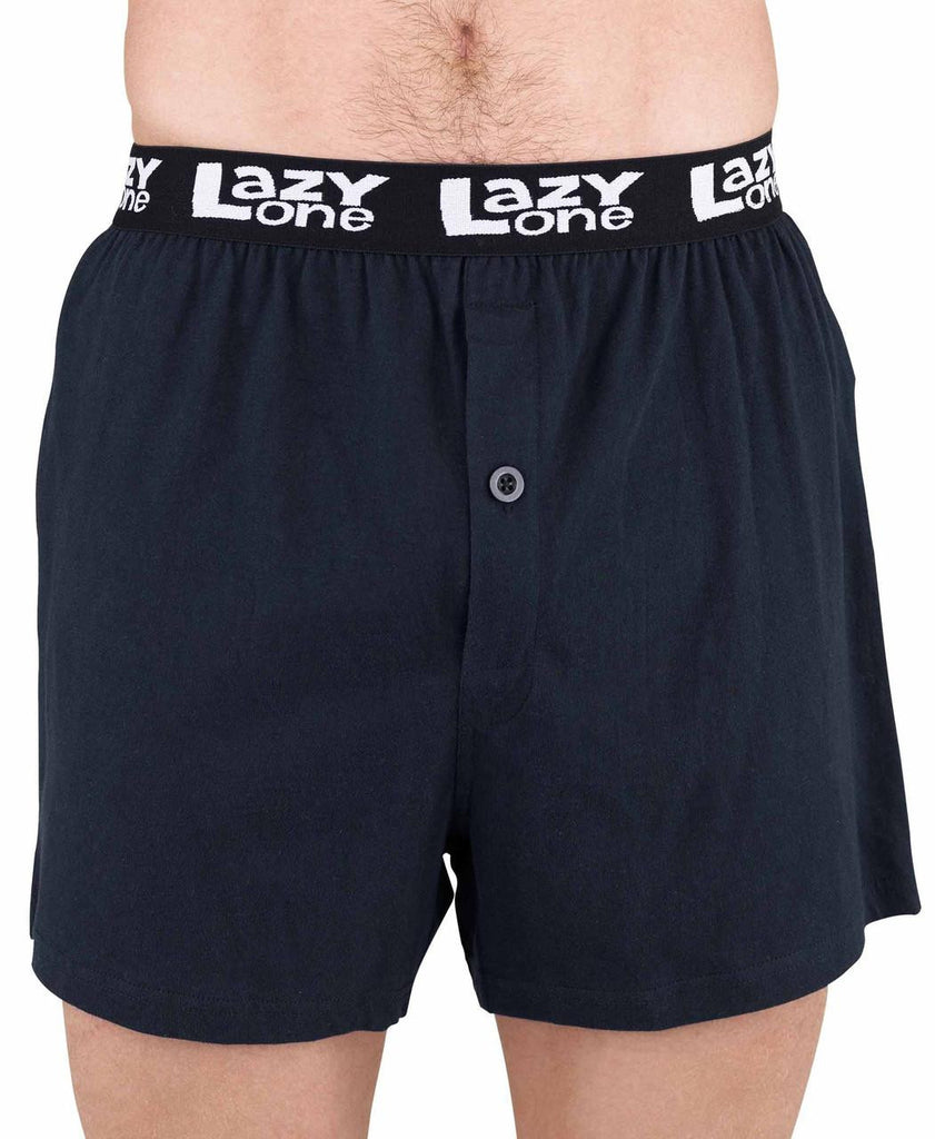 Navy blue boxer shorts with 'Lazy One' waistband on a white background