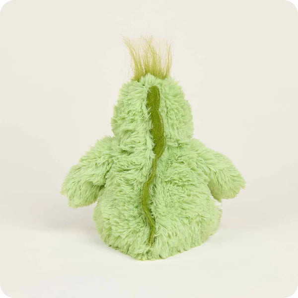 Green plush toy resembling a creature on a white background