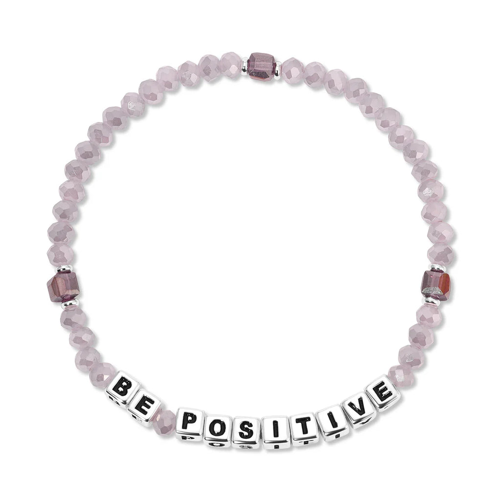 periwinkle cystal be positive bracelet on a white background