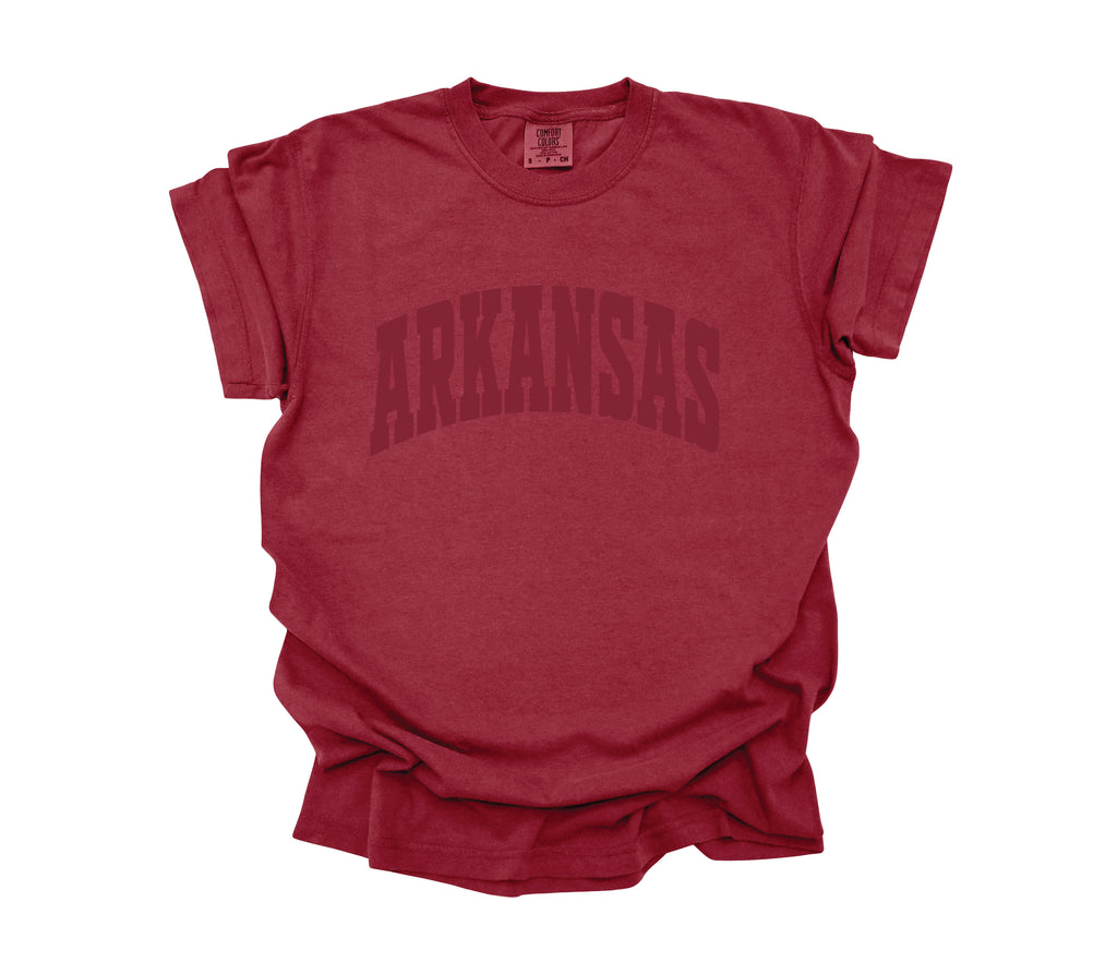 red Arkansas t-shirt on a white background