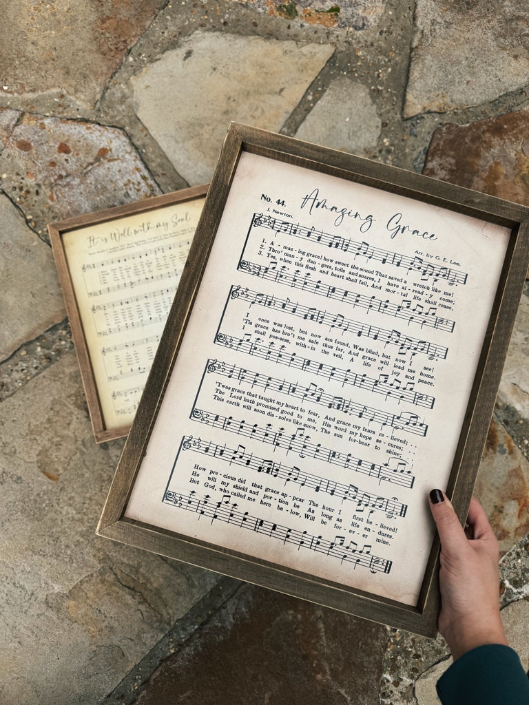 Amazing grace sheet music in a Frame with a rock background