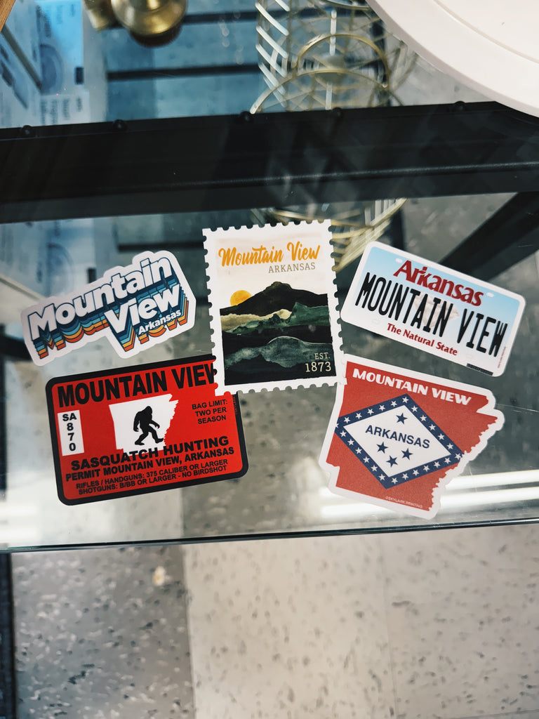 multiple stickers on a glass table