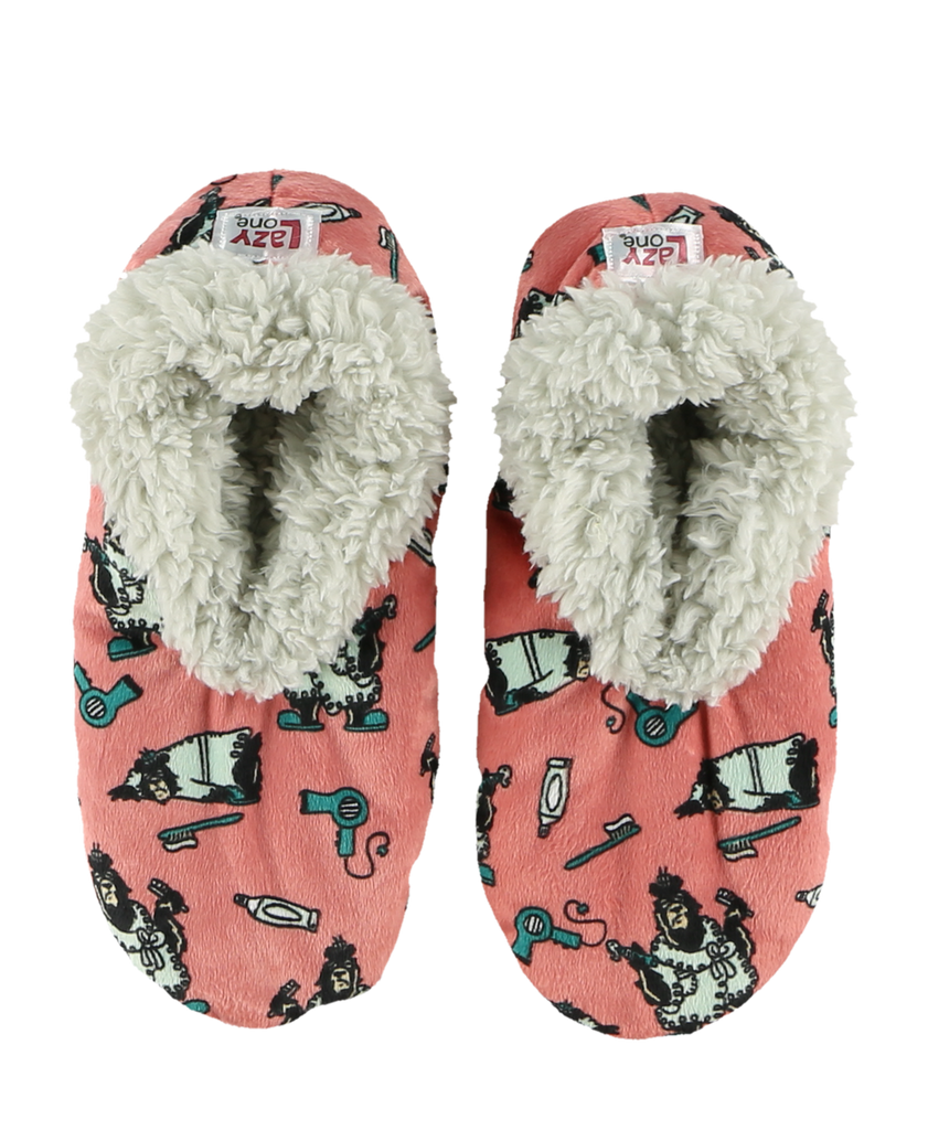 Pair of pink slippers with cartoon character design and white fuzzy interior on a white background