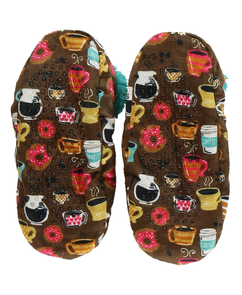 Pair of slippers with coffee-themed pattern on a brown background