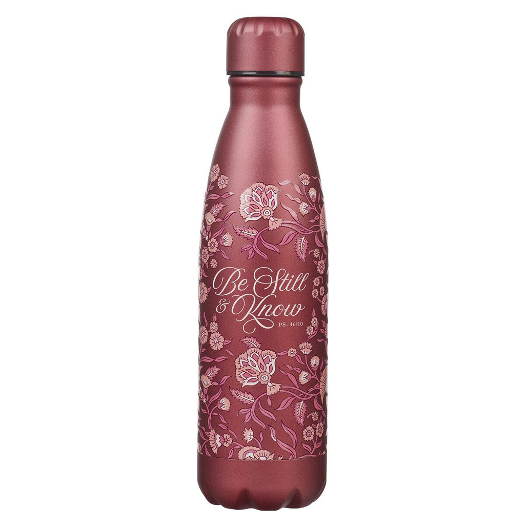 Red water bottle with floral design and 'Be Still & Know' text on a white background