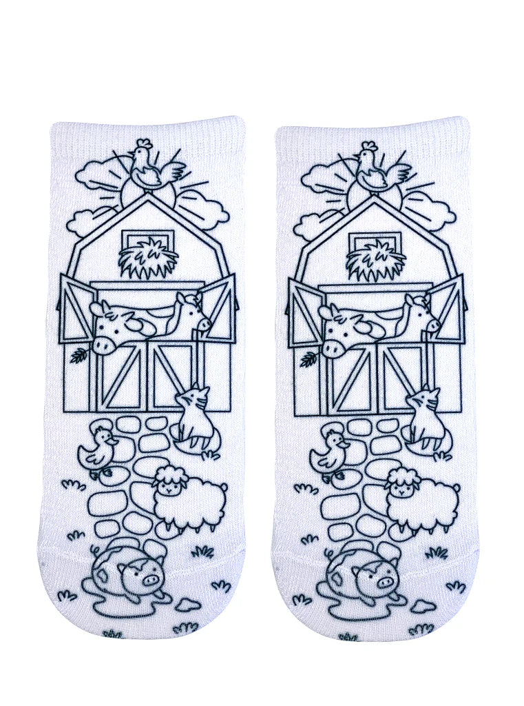 White socks with black farm animal illustrations on a white background