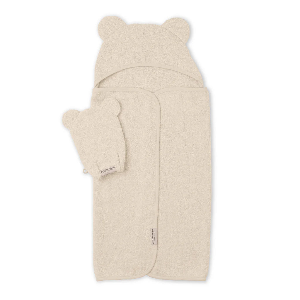 Beige baby blanket with bear ears and feet on a white background