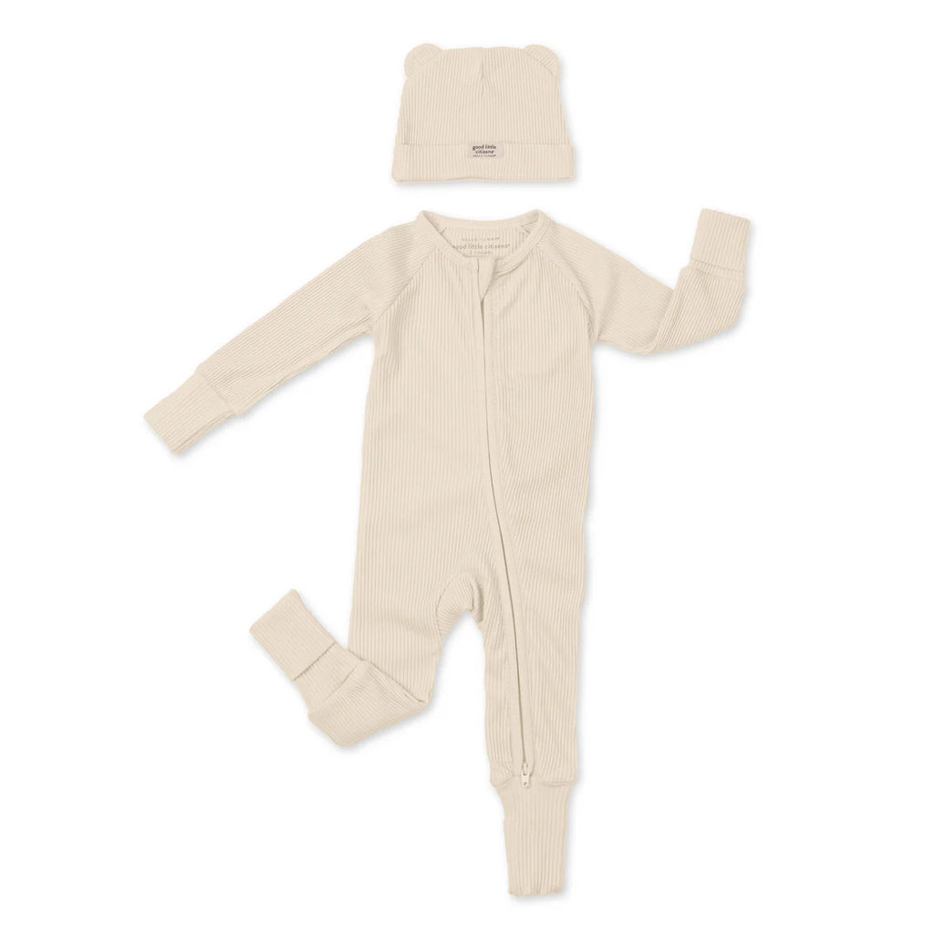 Beige baby onesie and hat set on a white background