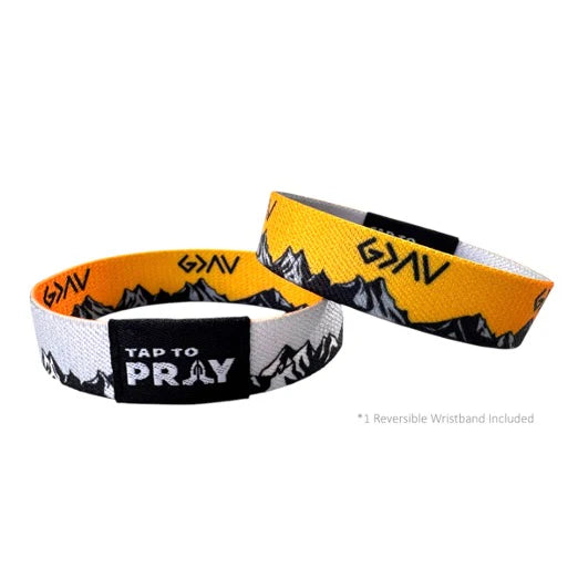 Two reversible wristbands with different designs on a white background