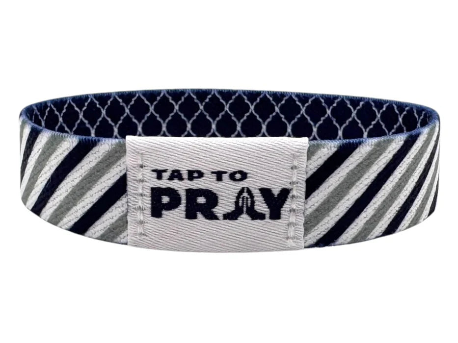 Wristband with 'Tap to Pray' text on a white background