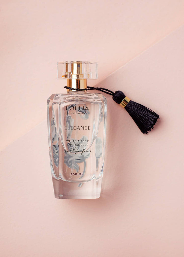 lollia elegance perfume on a pink background