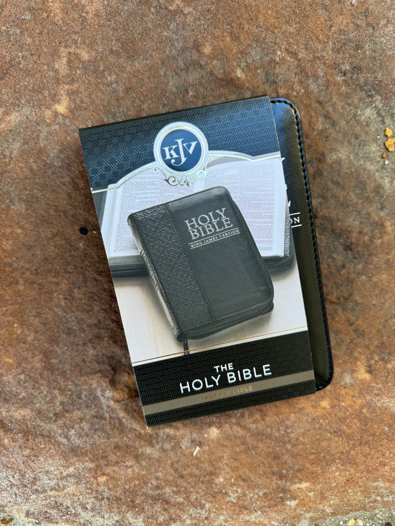 KJV Pocket Bible - Black Zipper on a brown background