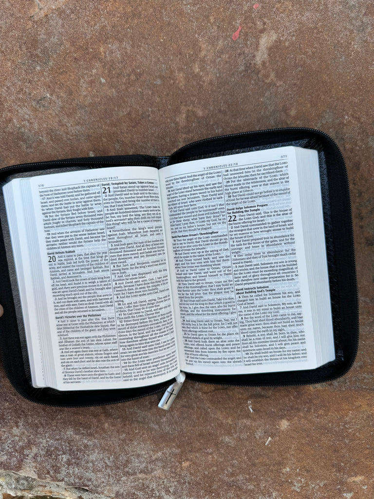 KJV Pocket Bible - Black Zipper on a brown background