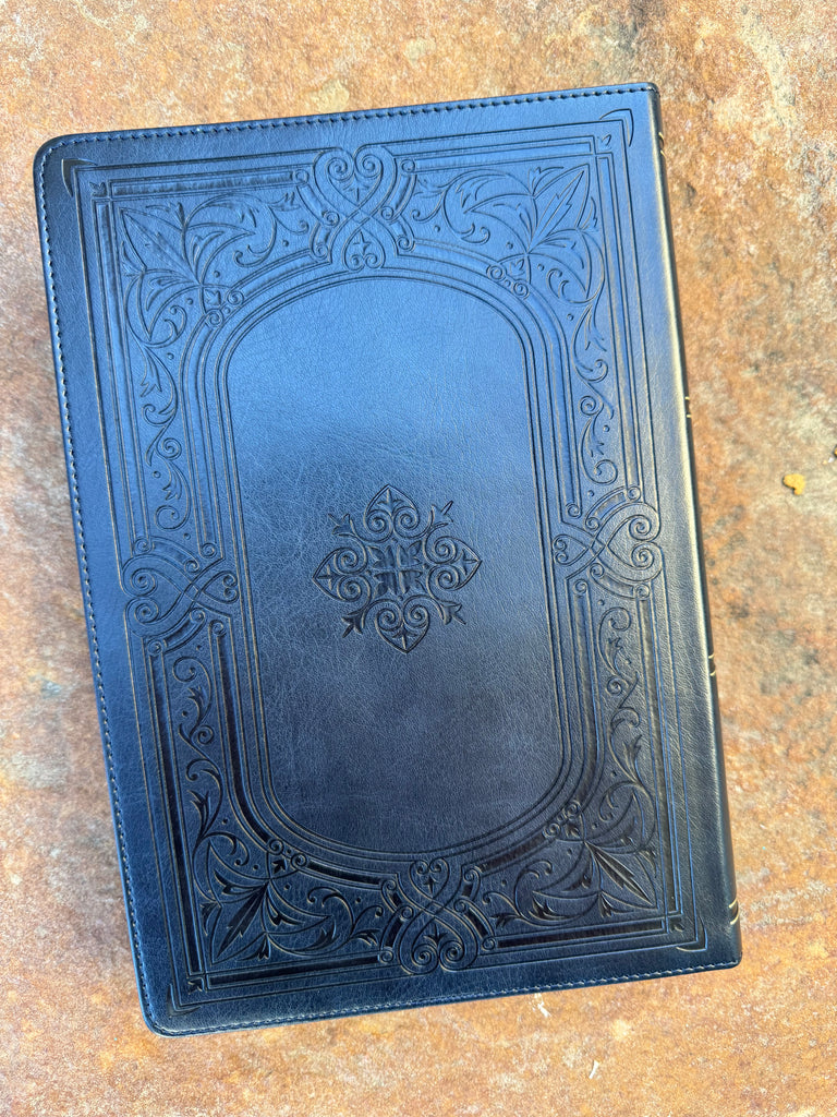 KJV Embossed Midnight Blue Giant Print Bible on a brown background