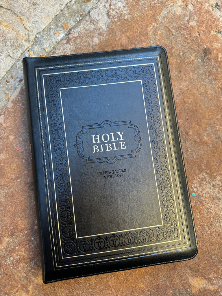 KJV Black Zipper Bible on a brown background
