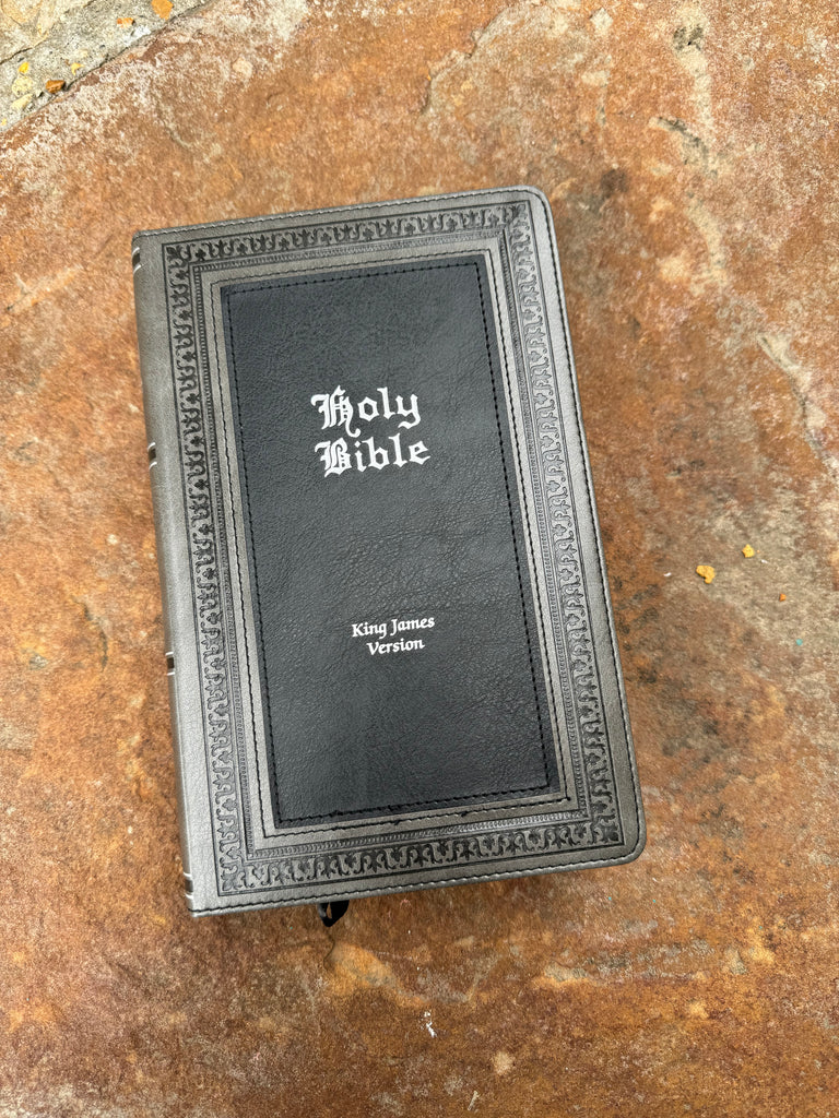 KJV Black & Gray Giant Print Bible on a brown background