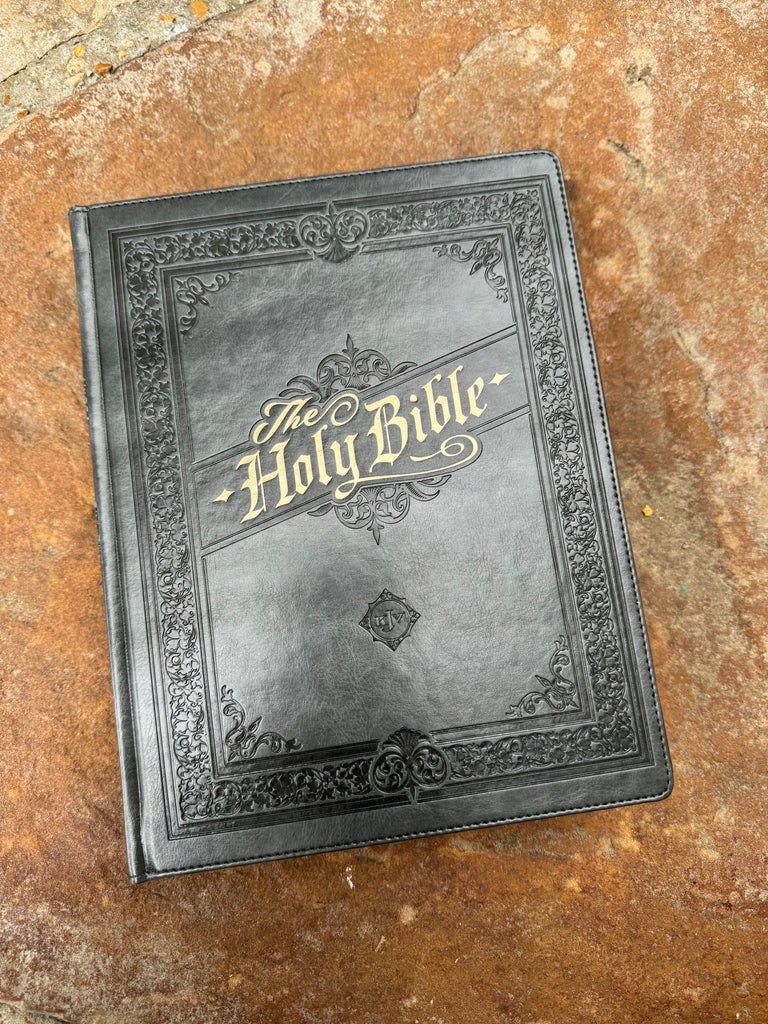 KJV Gray Hardcover Note-taking Bible on a brown background