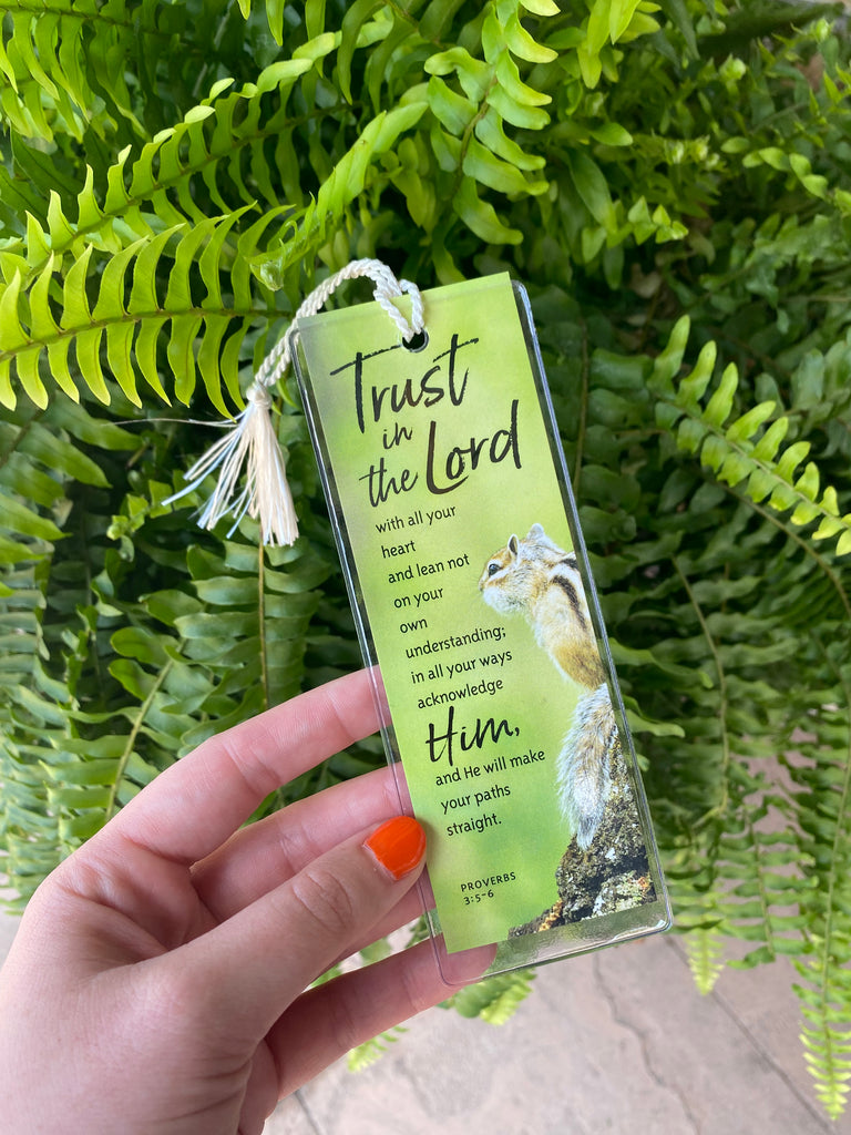 trust in the lord bookmark on a green fern