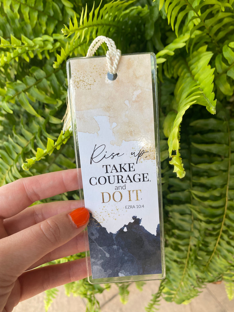 rise up bookmark on a green fern
