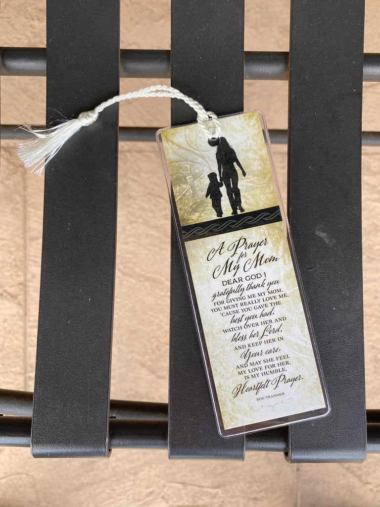 prayer for mom bookmark on a black metal bench