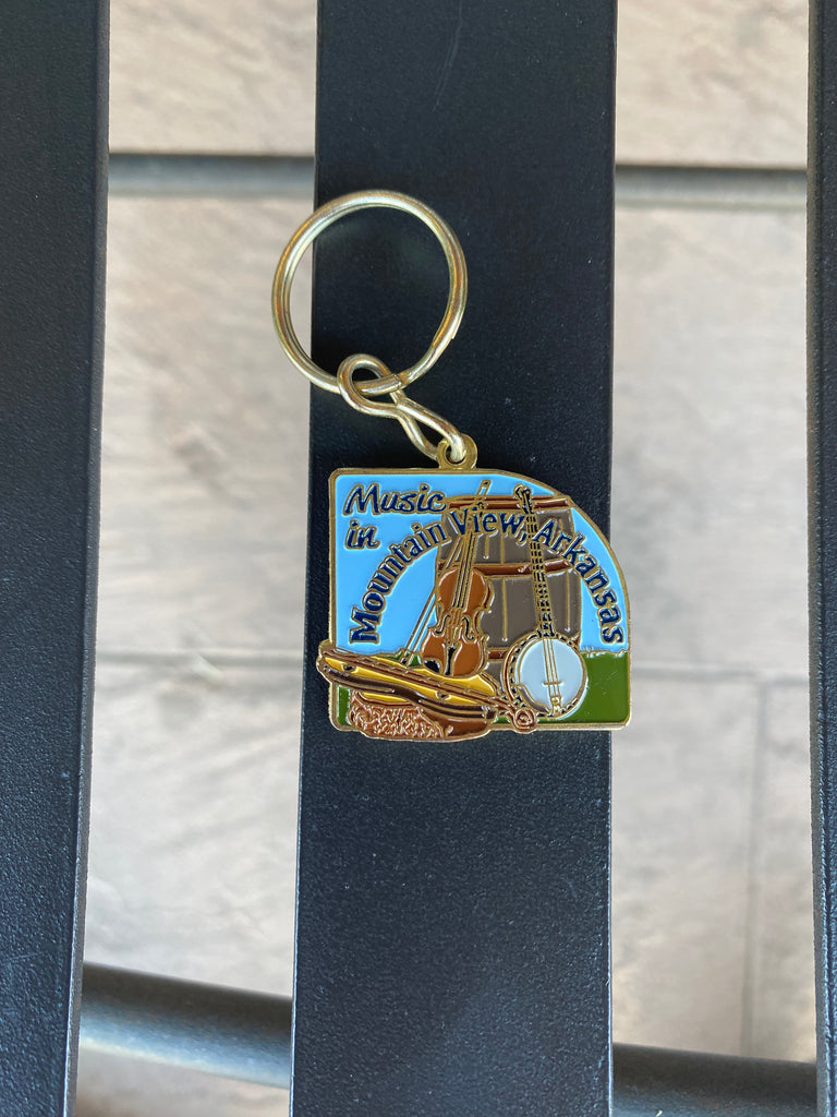 mountain view keychain on a black metal bench