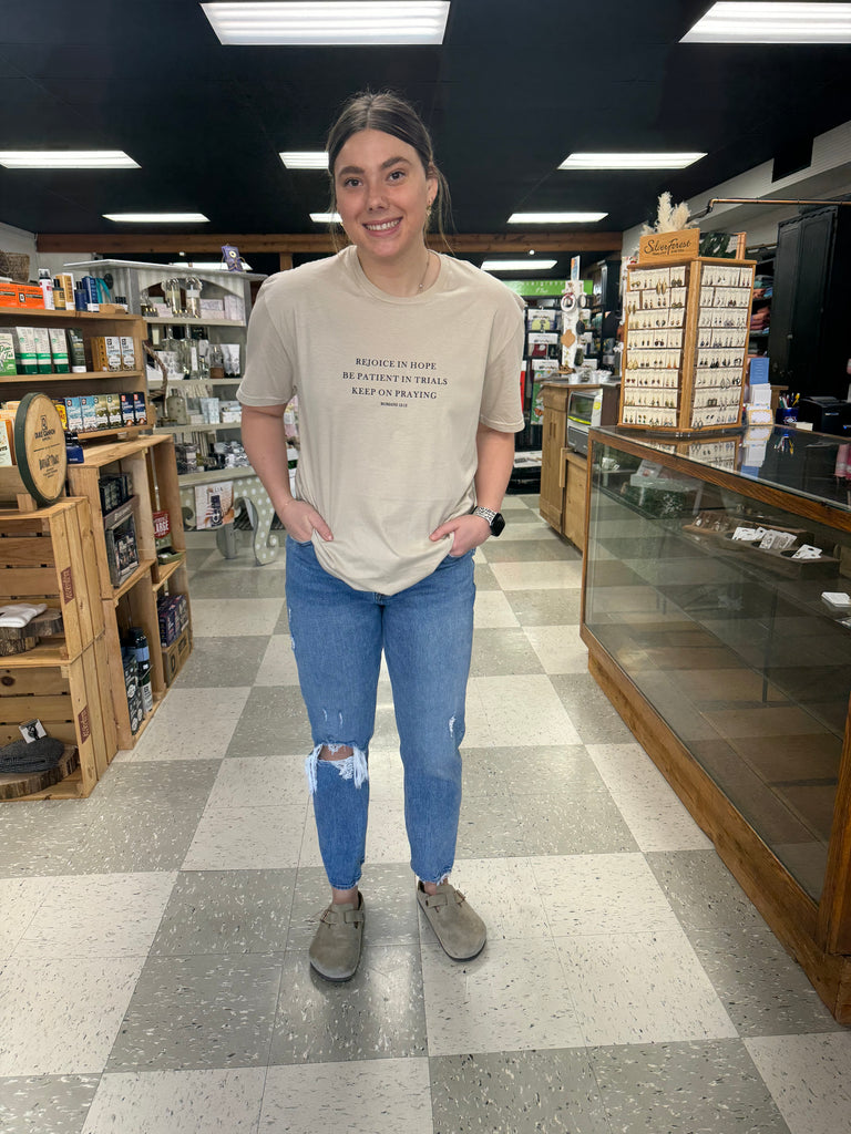 rejoice tee being worn in a store