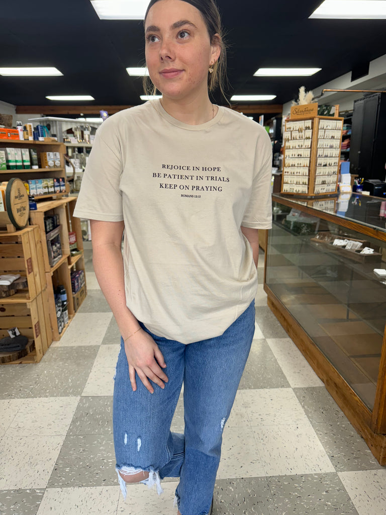 rejoice tee being worn in a store