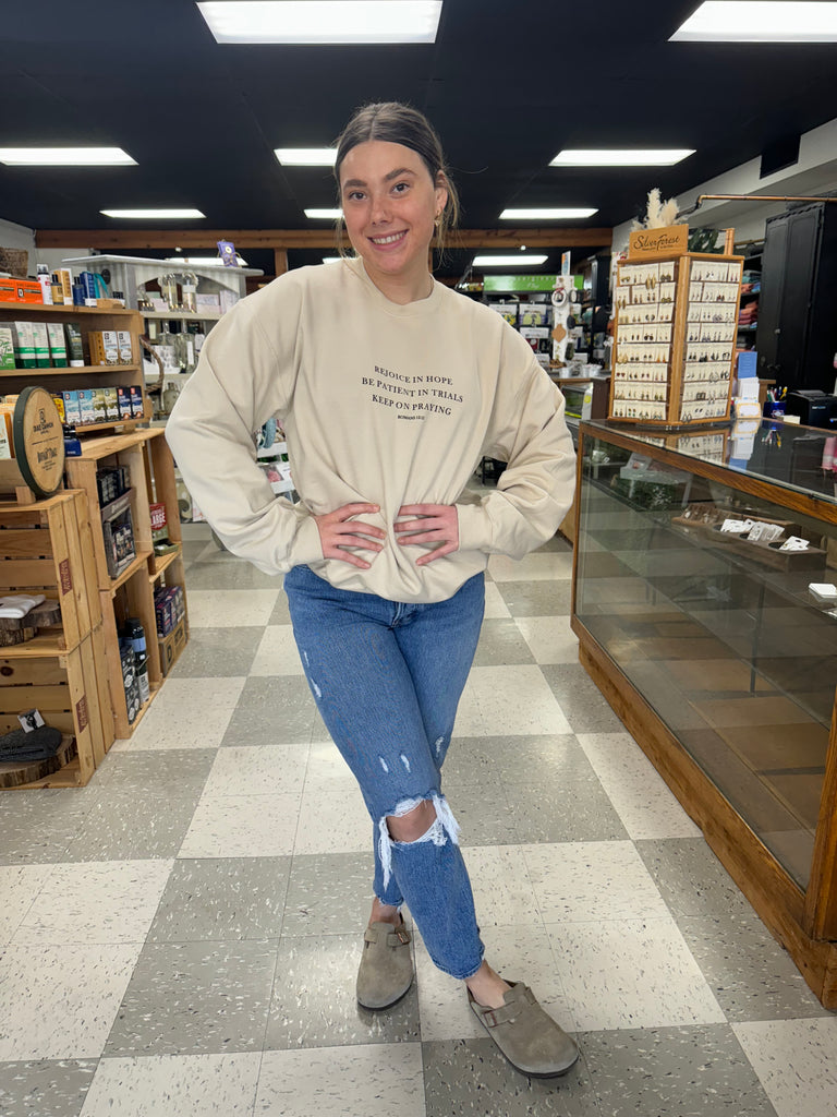 rejoice sweatshirt being worn in a store