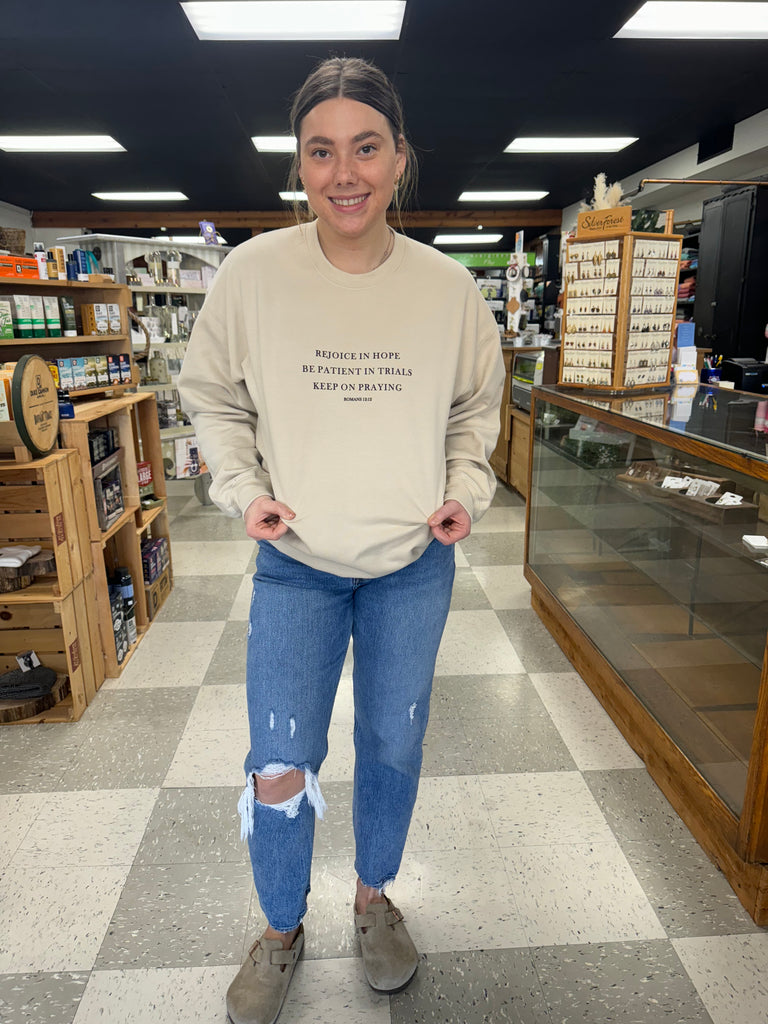 rejoice sweatshirt being worn in a store