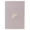 Light gray notebook with a floral design on a white background