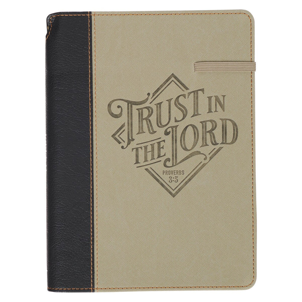Notebook with 'Trust in the Lord' text on a beige and black cover