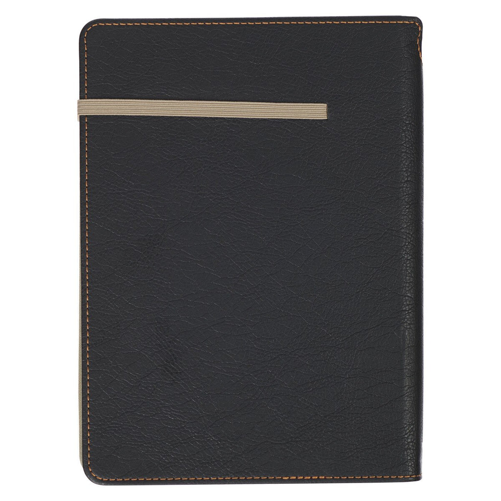 Black leather notebook with gold accent on a white background