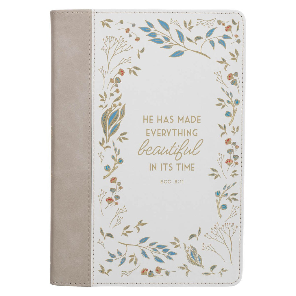 beige and cream journal on a white background