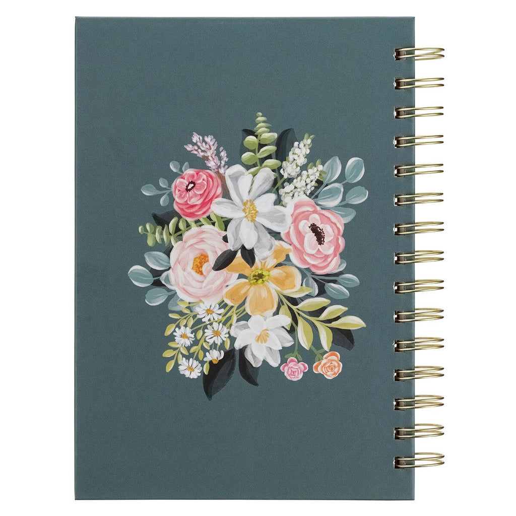 Notebook with floral design on a dark blue background