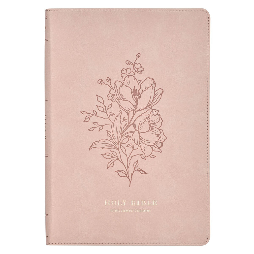 Pink notebook with floral design and 'Holy Bible' text on a white background