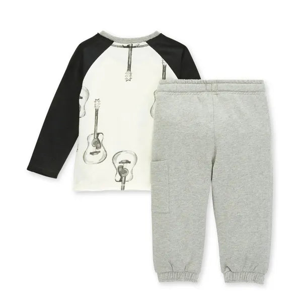 burt's bees babies guitar pant set gray pants and a white top with black sleeves with gray guitars on the shirt